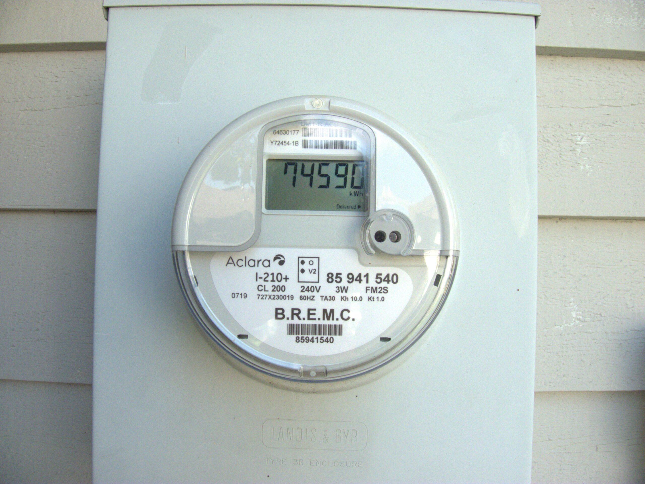 Utility revenue grade digital smart electricity meter recording gross kilowatt hour generation